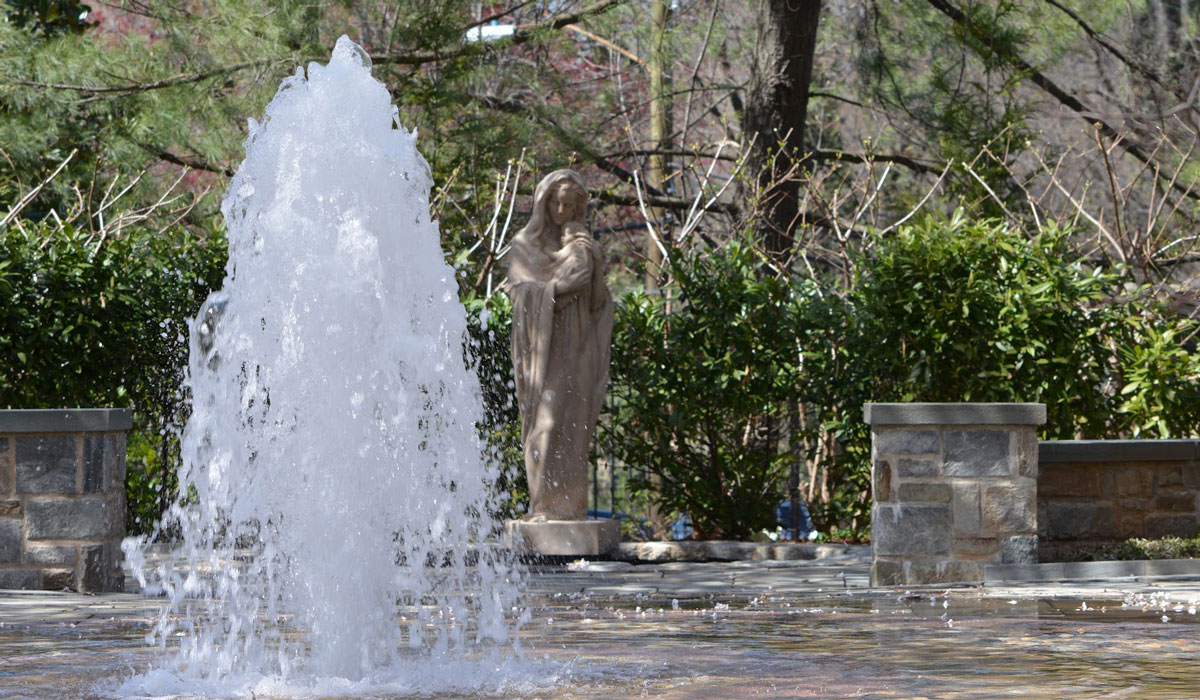 fountain in front of statue of Mary